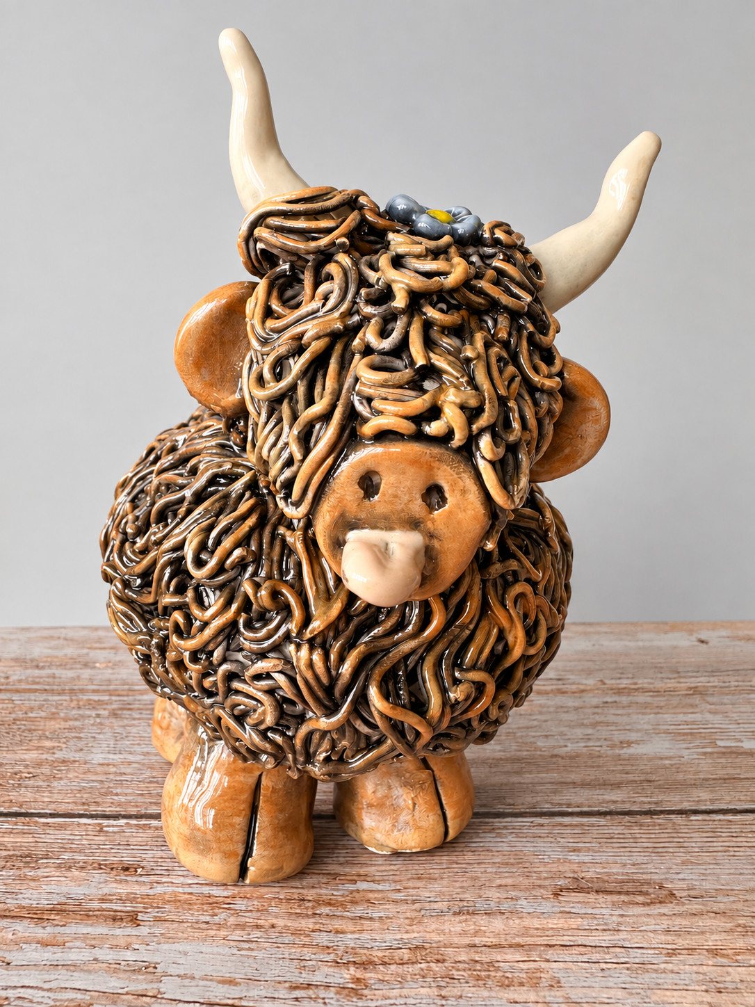 Highland Cow with the Flower